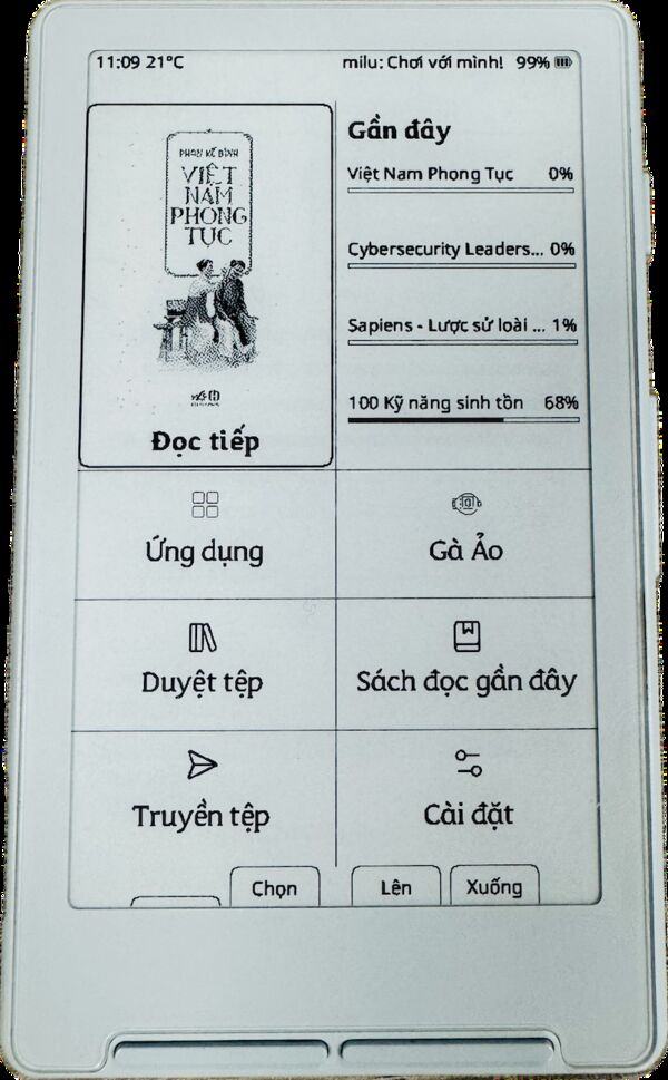 CrossPet Reader homescreen on Xteink X4 showing Vietnamese UI, book covers, reading progress, and virtual chicken menu
